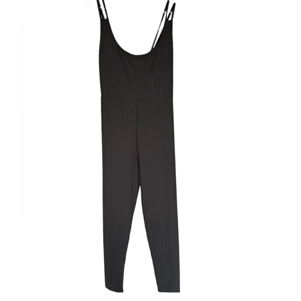Pretty Little Thing black romper/jumper.
Spaghetti straps size 12
